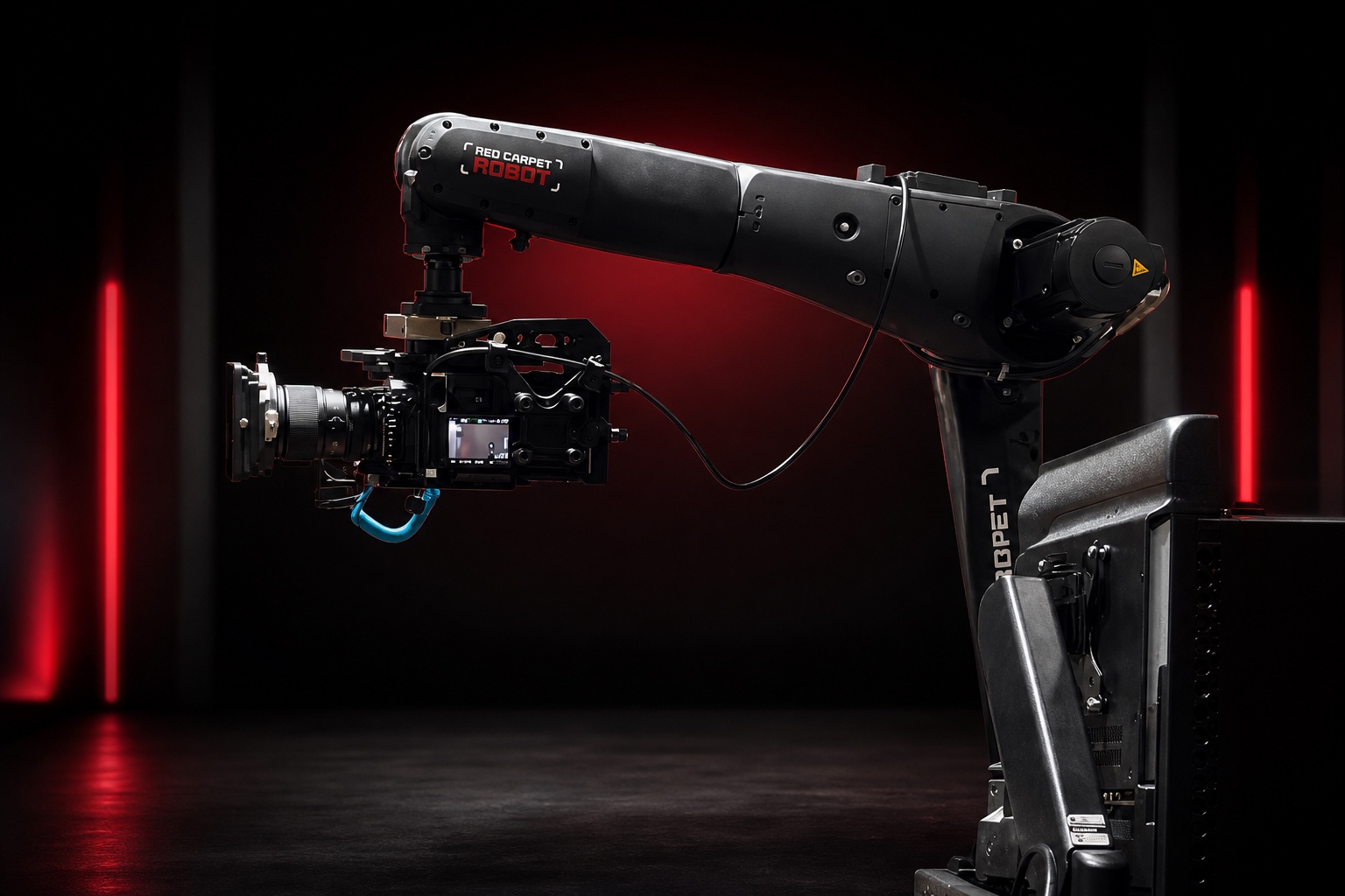 Red Carpet Robot Max KUKA robot in a cinematic studio with a professional camera and lens mounted to the arm